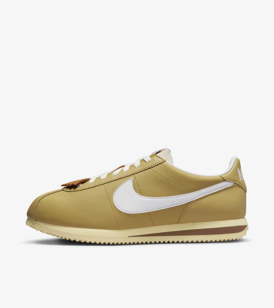 white and gold cortez